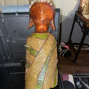 Decorative Buddha Statue with Green and Gold Accents